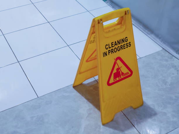 istock Cleaning in progress sign in department store's bathroom 2145490831