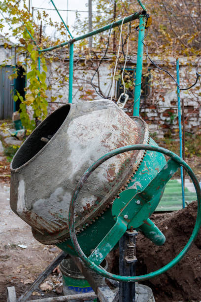 Mixing of concrete in the concrete mixer at construction site