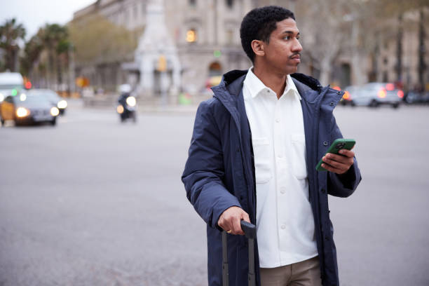 istock Street Businessman commuter technology smart phone. 2145507451