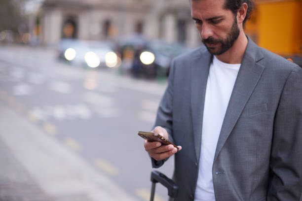 istock Street Businessman commuter technology smart phone. 2145507989