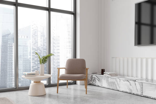 istock Cozy living room interior with couch and tv screen and panoramic window 2145537855