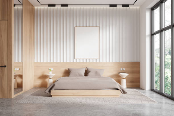 istock White and wooden master bedroom interior with poster 2145547647