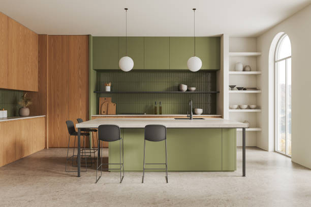 istock White and green kitchen interior with island 2145551340
