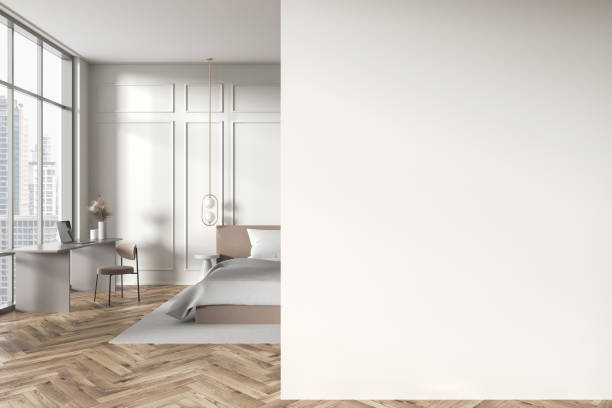 istock Cozy hotel bedroom interior with bed, workplace and window. Mockup wall 2145559098