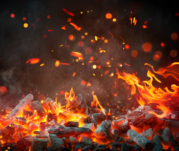 istock Charcoal For Barbecue Background - Hot Flames And Abstract Defocused Sparks 2145642415