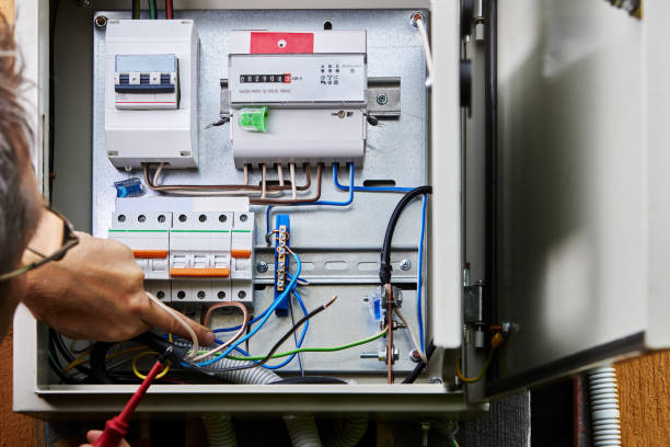 istock Wiring installation in rural house, connect three-phase power cable for external distribution board. 2145846501