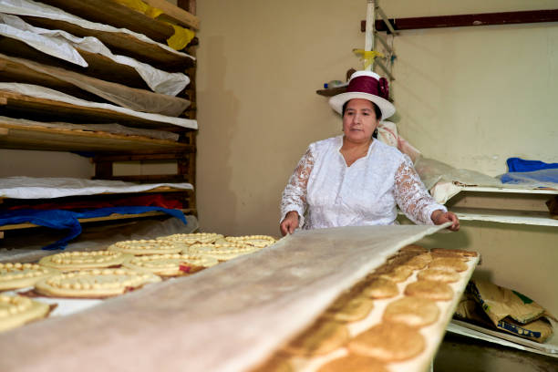 istock A baker from the Peruvian town of Oropesa keeps the dough already prepared and ready to bake in the warehouse. 2145873404