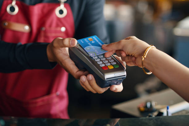 istock Woman Paying for Order in Restaurant 2145924223