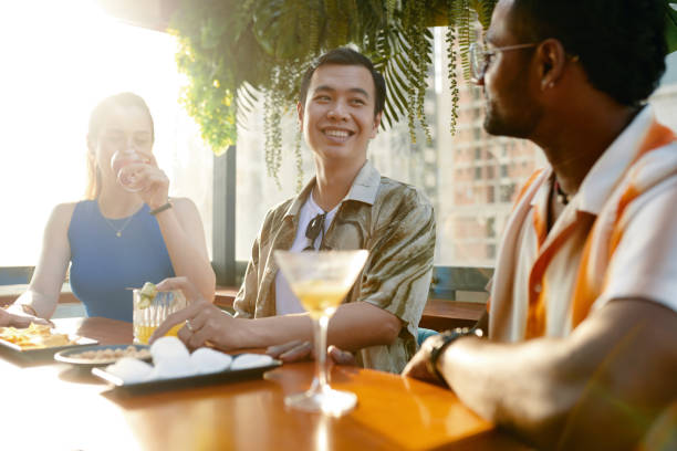 istock Man Talking to Friend in Pub 2145924532