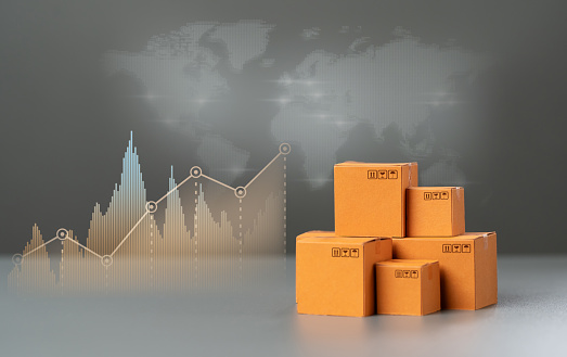 Boxes with goods and sales growth charts. Growing economy. Consumer sentiment and demand for goods. Increase in sales, production, transportation and orders. Trade agreements.