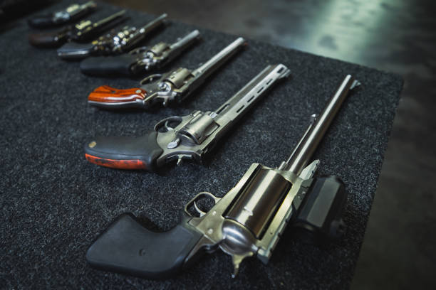 istock Firearms in a shooting range, magnum revolvers on the table. 2145944442