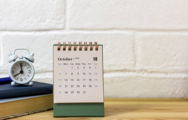 istock October 2024. Monthly desk calendar for 2024 on the table. Home office. 2145956863