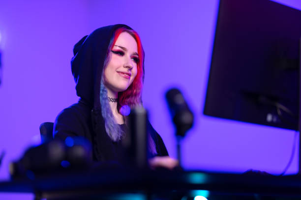 istock Confident Female Gamer Engaged in Competitive Gaming 2145957381