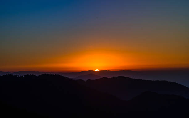 istock Sunrise over the Mountain 2145973436