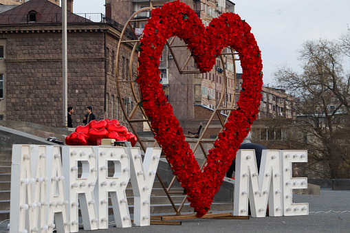 Armenia, Yerevan - March 8, 2024: Red heart and the inscription Marry me, a place for lovers