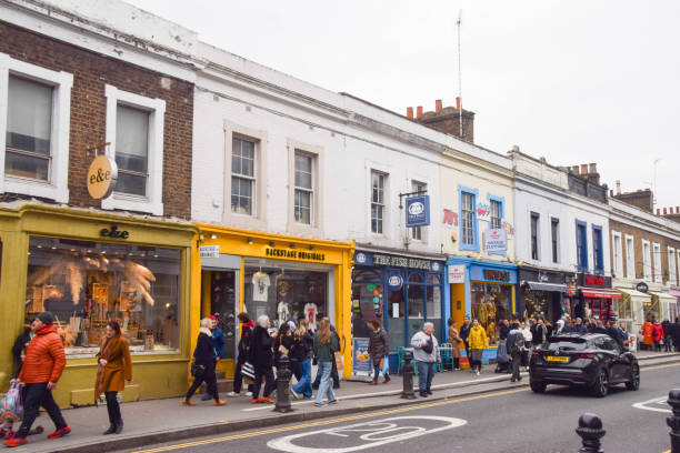 London, UK - April 1 2023: People visit shops in Notting Hill.