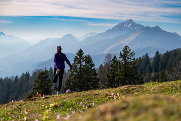 istock Side view of woman doing leg stretch. 2146057926