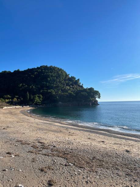 istock Pebble beach on Montenegrin coast with clear water and by summer day. 2146080463