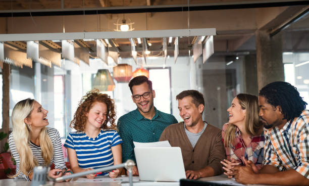 istock Business solutions, technology and strategy concept. Colleagues working and brainstorming in office 2146092503