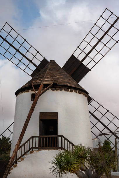 istock A windmill with a white roof and a black top 2146108709