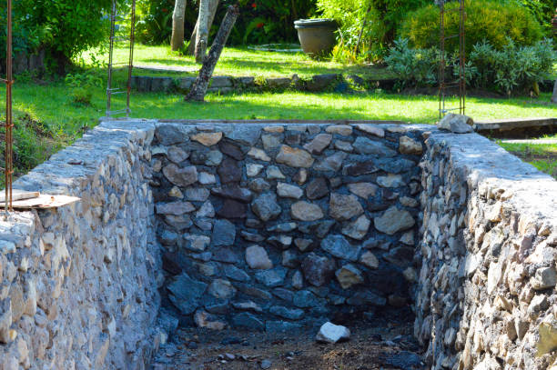 istock Construction Project Foundation Amidst The Trees And Plants In The Garden 2146135351