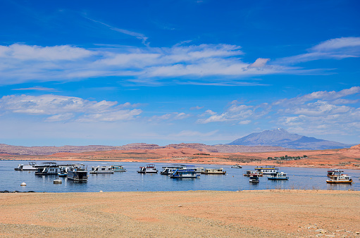 Halls Crossing Marina Lake Powell.  Houseboats , boats and docks in scenic Lake Powell country.  Halls Crossing Marina Lake Powell
