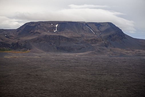 Aerial view of Bláfjall tuya volcano and the bleak, rugged landscape between Mývatn and the Bardarbunga eruption at Holuhraun, Central Highlands, Iceland.