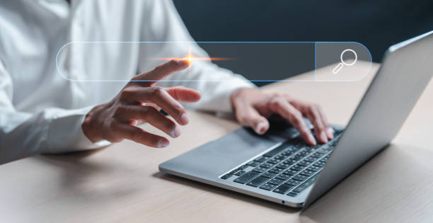 istock Man hand touching on search bar for Search Engine Optimization or SEO concept to find information or data with ai technology by internet connection. 2146203040
