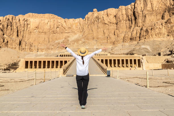 istock View at Woman at Hatshepsut Temple 2146211981