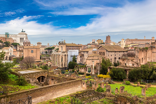 View at Ancient ruins of forum and Victor Emmanuel II monument in a winter day in Rome, Italy