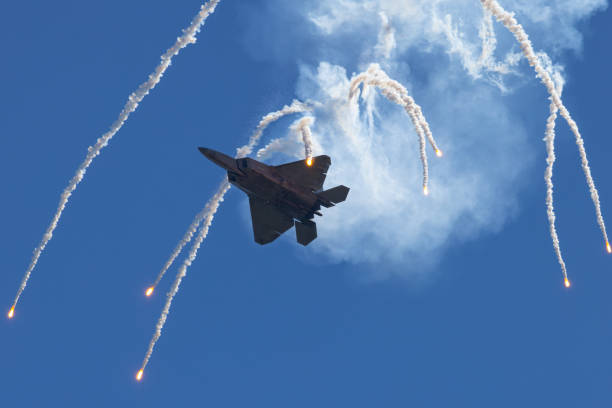 istock Bottom view of a F-22 Raptor deploying flares 2146393746