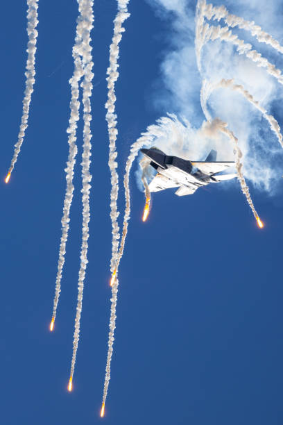 istock Bottom view of a F-22 Raptor deploying flares 2146393754