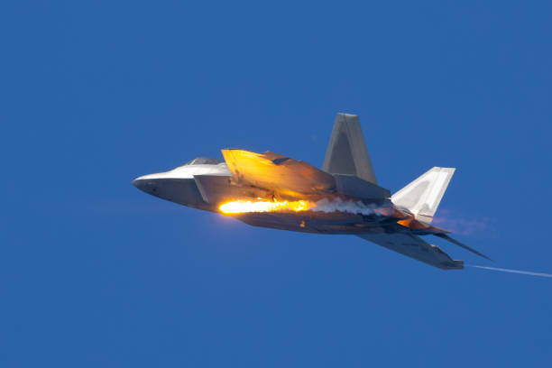 istock Side view of a F-22 Raptor deploying a flare 2146394270
