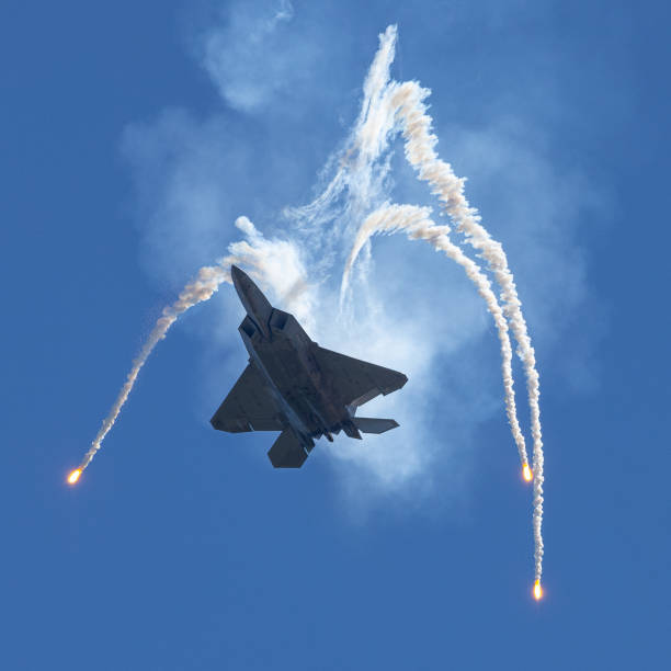 istock Bottom view of a F-22 Raptor deploying flares 2146394738
