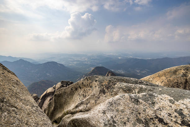 view from the top of bukhansan baegundae mountain peak in south korea.