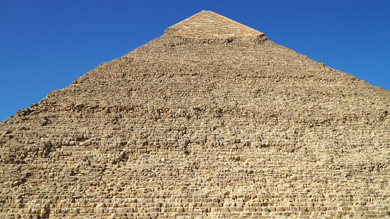 View of Pyramid of Khafre with tourists, Giza Pyramid Complex, Giza, Cairo, Egypt.