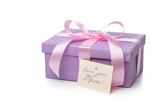 Mother's Day concept with purple gift box and greeting card isolated on white background. High resolution 42Mp studio digital capture taken with Sony A7rII and Sony FE 90mm f2.8 macro G OSS lens
