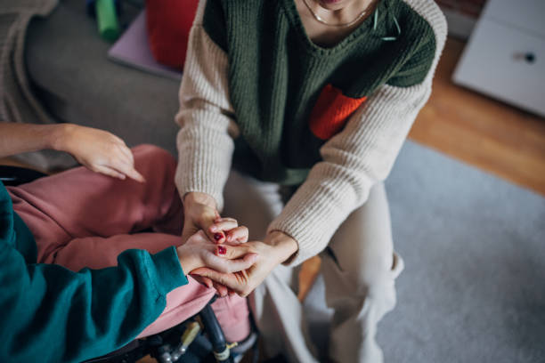 istock A mother and daughter enjoy a playful exercise at home 2146478587