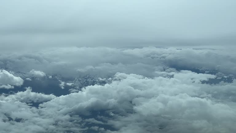 Immersive Pilot POV flying across a snowed mountainous landscape shot from a jet cabin. Guadalajara, Spain.4K