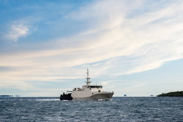 istock Harbinger of Calm: A Patrol Boat Under Dramatic Skies 2146538620