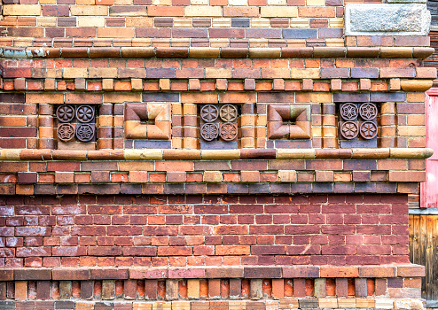 Fragment of the brickwork of the Cathedral of the Nativity of the Blessed Virgin (1900) in Lyubytino, Novgorod region, Russia
