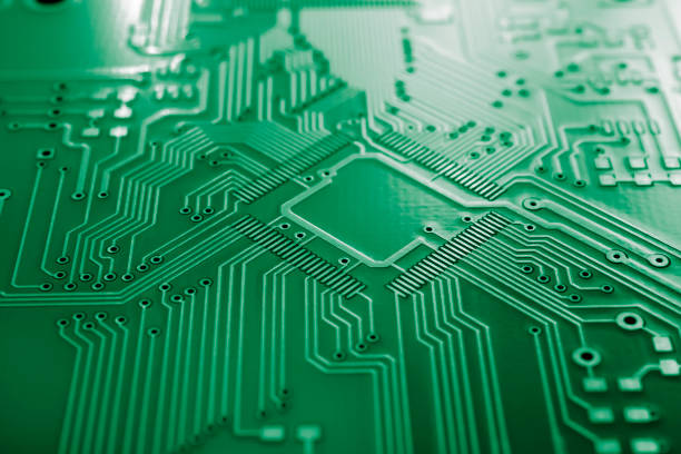 Backlit green printed circuit board with an blank microchip.