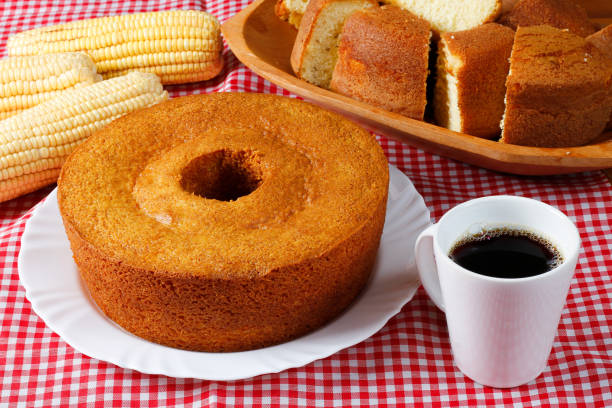 istock corn cake on white plate on rustic wooden table. Typical Brazilian party food. 2146699614