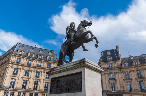 Paris, France - May 2019: Louvre palace and Tuileries garden in spring
