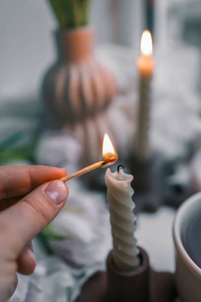istock Girl lights a candle, spring aesthetics 2146713061