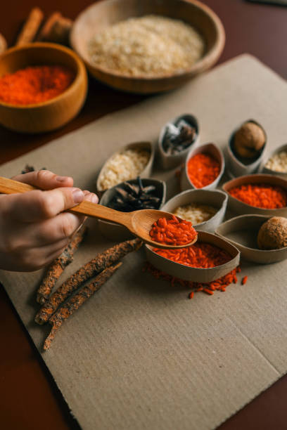 istock Montessori and Sensory Development, A child sorts cereals by color 2146718721