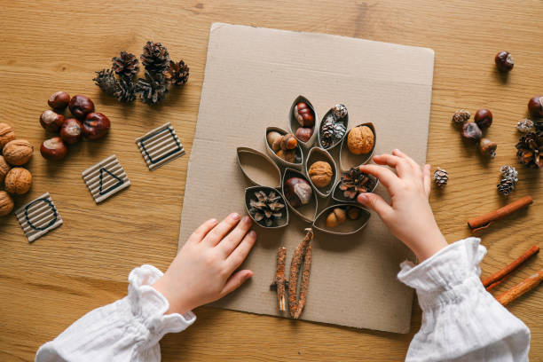 istock Montessori and Sensory Development, A child plays with natural materials 2146719443