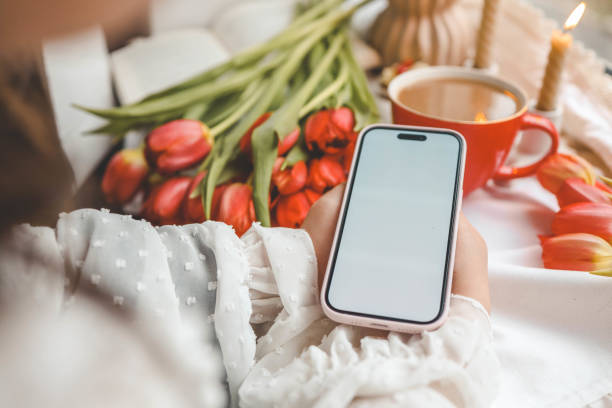 istock Phone with isolated screen on background of spring decor 2146719962