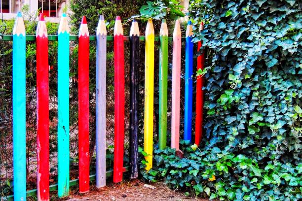 Colorful garden fence in pencil shape