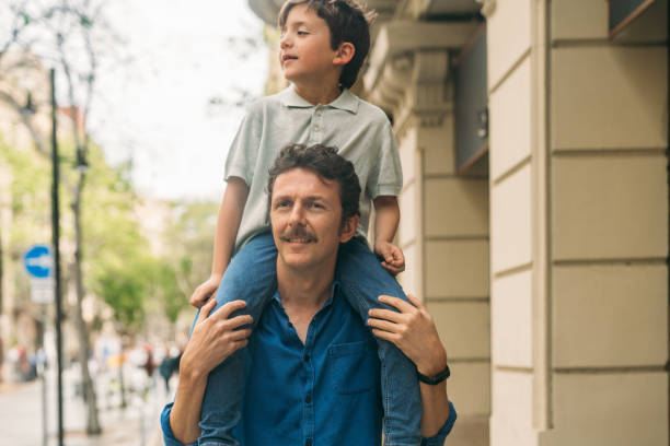 istock Man with his son visiting Barcelona 2146724699